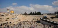 people gathering at the Western Wall gathering at the kotel